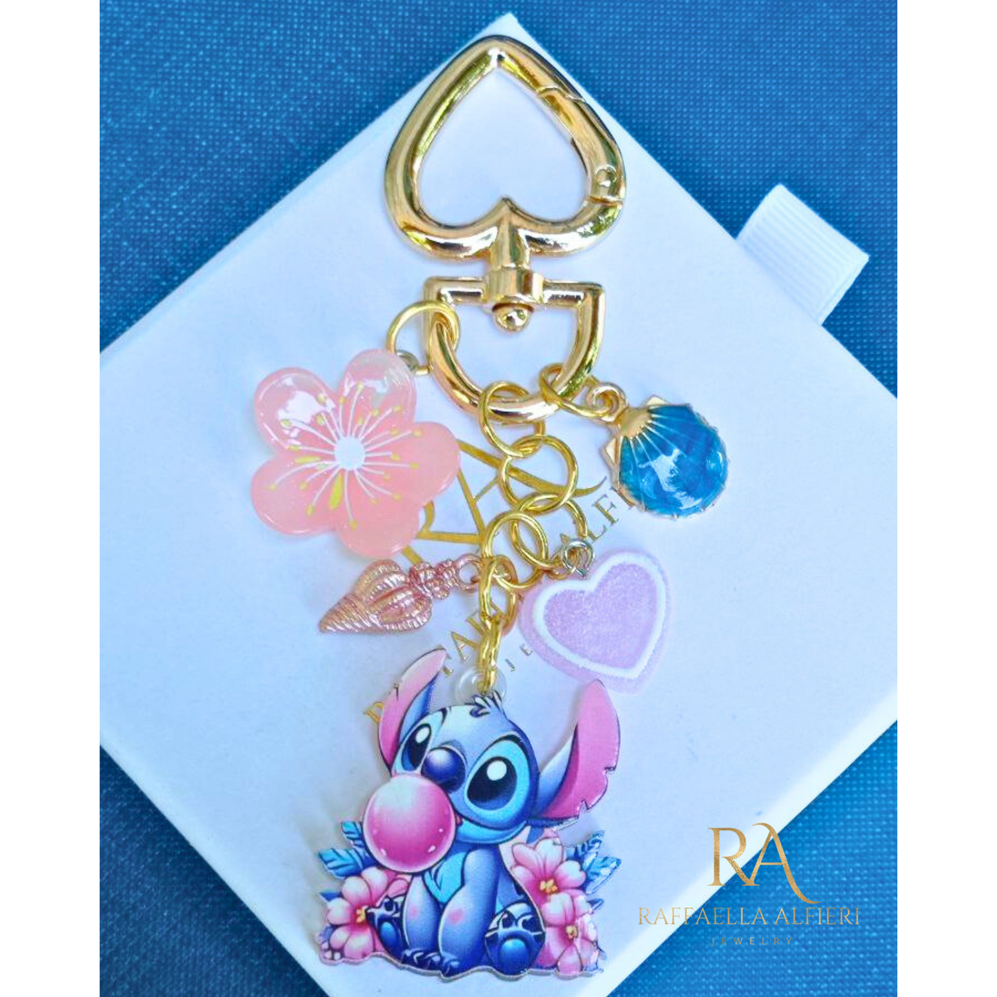 Portachiavi Stitch e Angel Disney con conchiglie dorate e stelle marine - Ciondolo per borsa Lilo & Stitch"