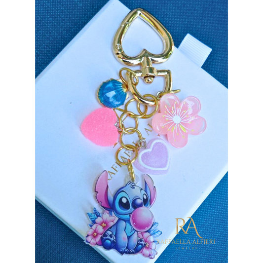 Portachiavi Stitch e Angel Disney con conchiglie dorate e stelle marine - Ciondolo per borsa Lilo & Stitch"