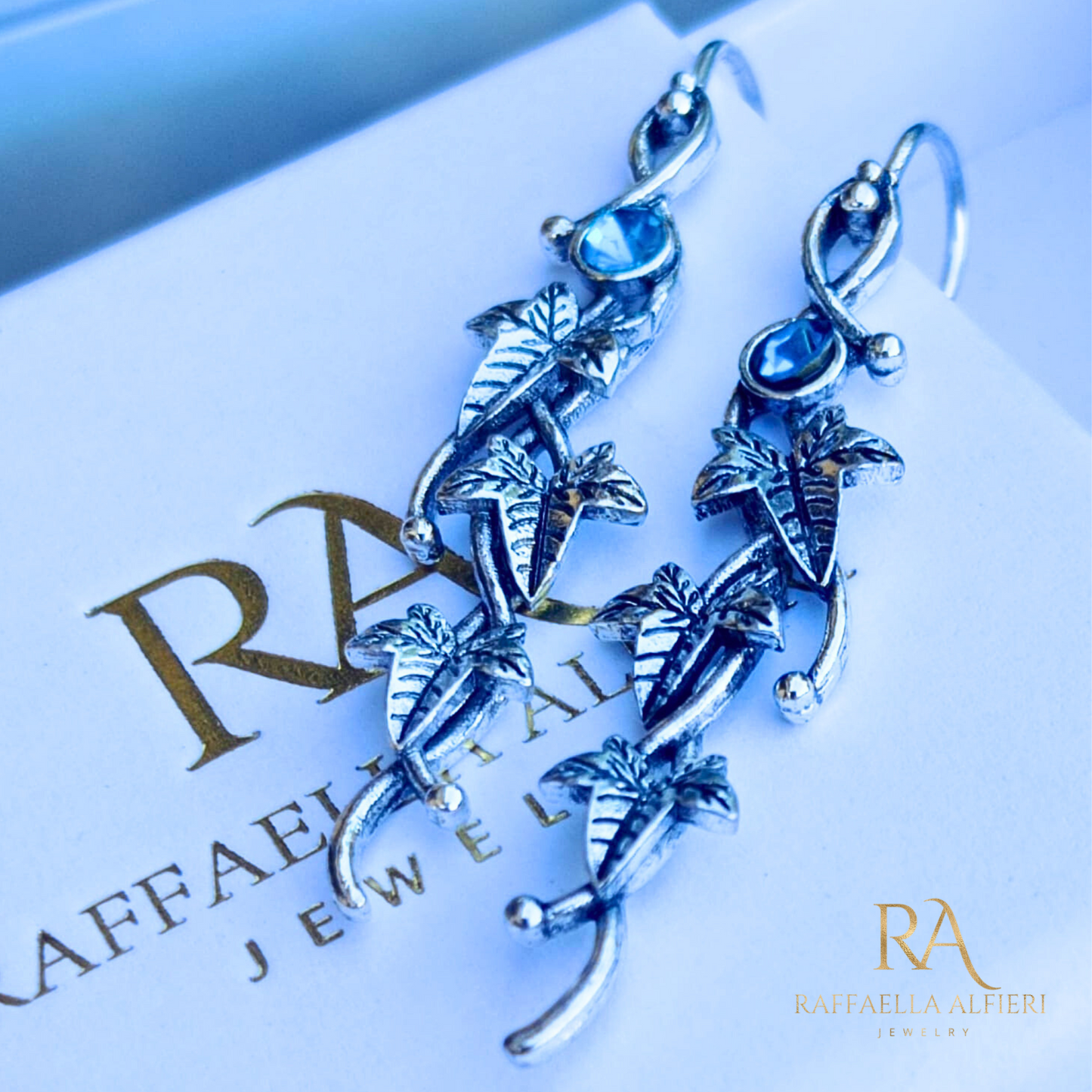 Earrings inspired by The Hobbit leaves light blue zircon