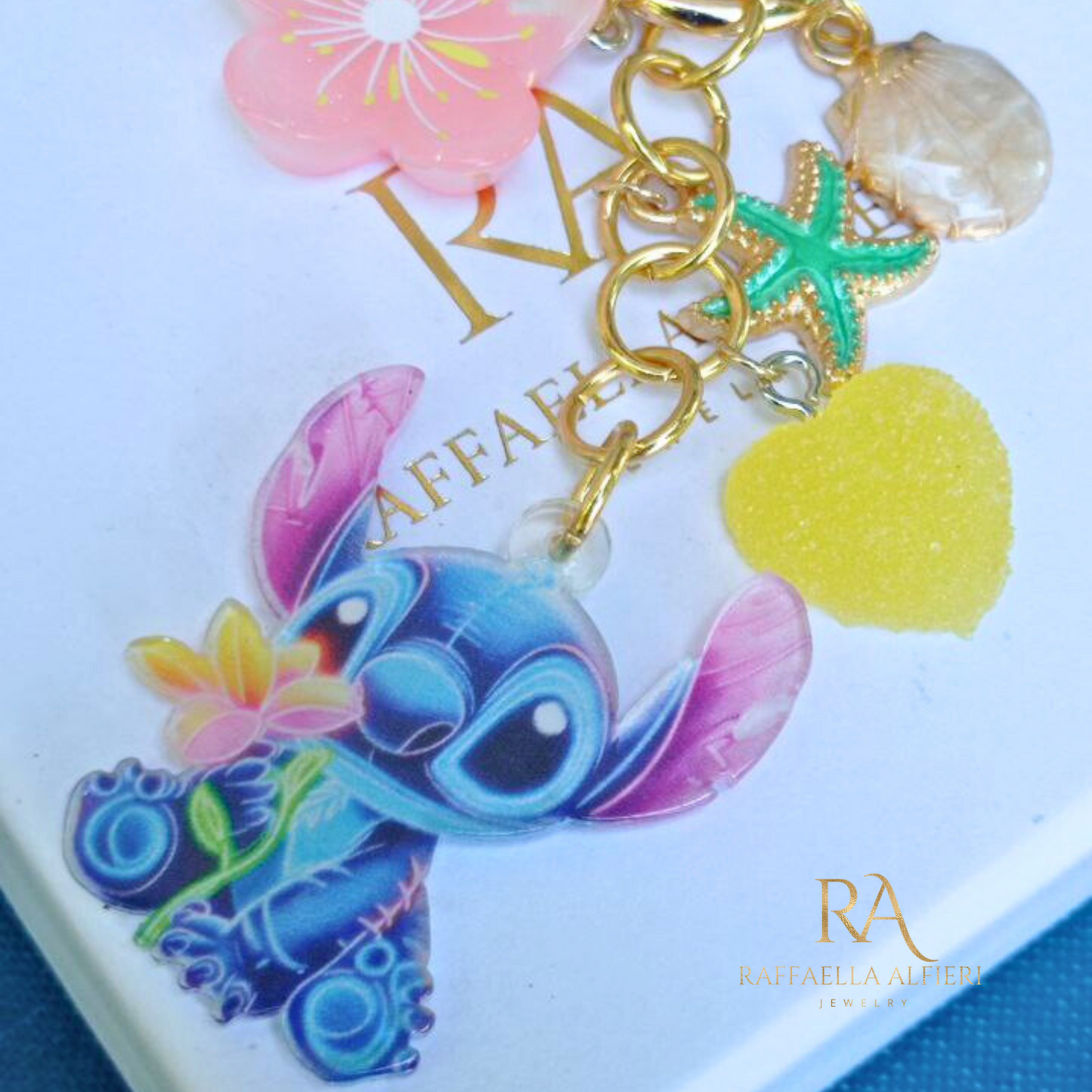 Portachiavi Stitch e Angel Disney con conchiglie dorate e stelle marine - Ciondolo per borsa Lilo & Stitch"