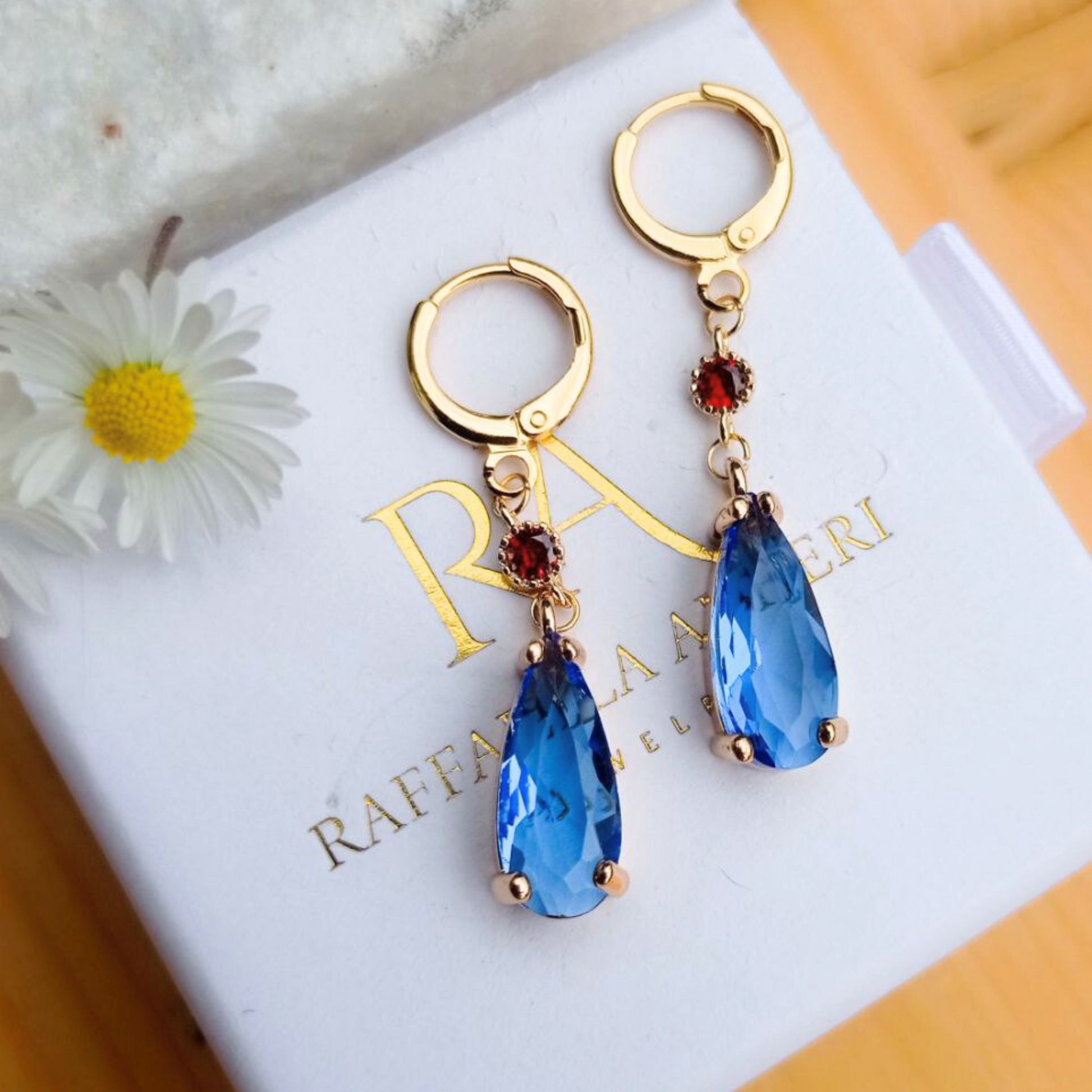 Fantasy Style Earrings Blue Crystal Design Gold Plated Statement Piece Elegant Drop Shape Modern Fashion Collection Special Occasion Jewelry Premium Quality Construction Unique Artistic Creation Beautiful Statement Accessory Formal Event