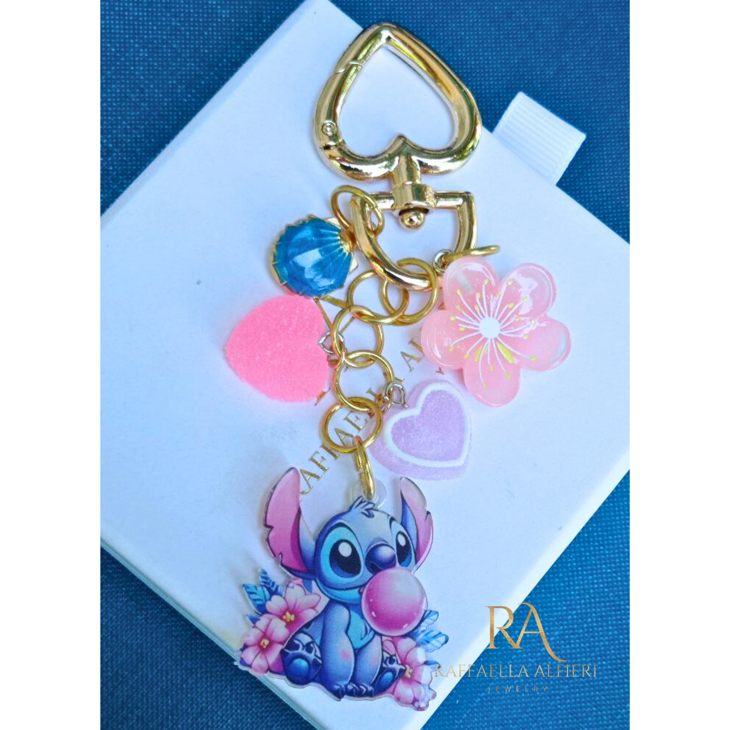 Portachiavi Stitch e Angel Disney con conchiglie dorate e stelle marine - Ciondolo per borsa Lilo & Stitch"
